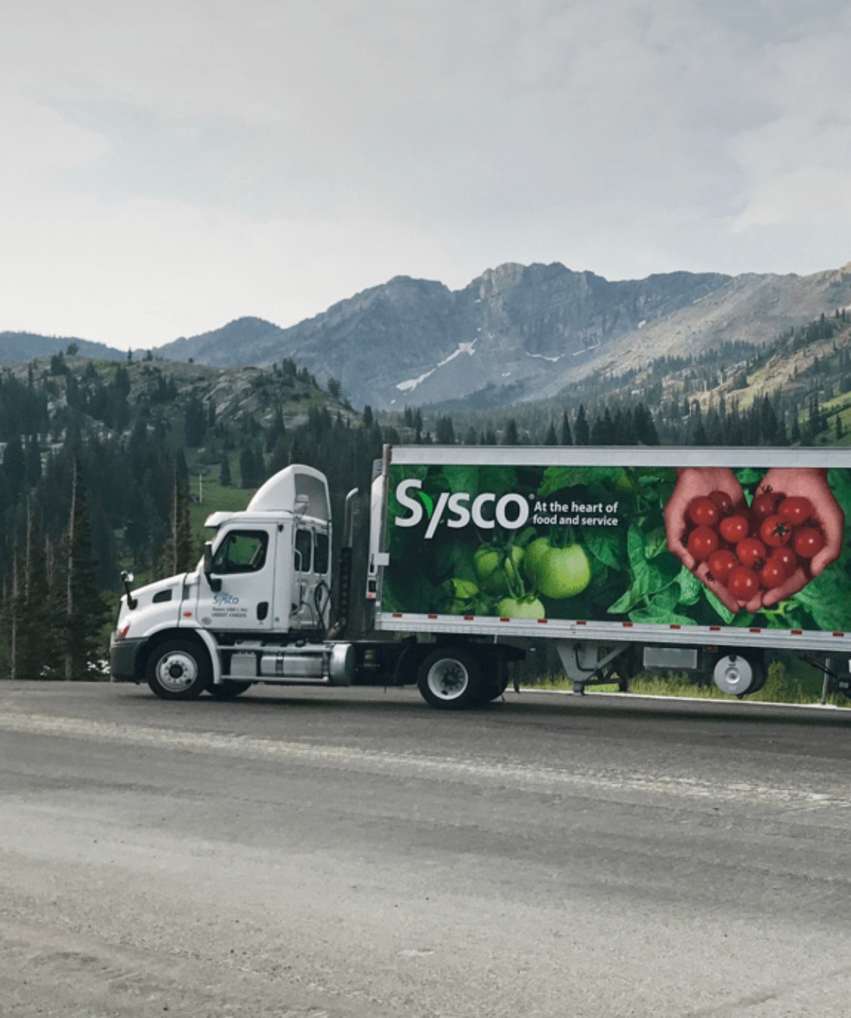 Sysco delivery truck parked on a mountain road